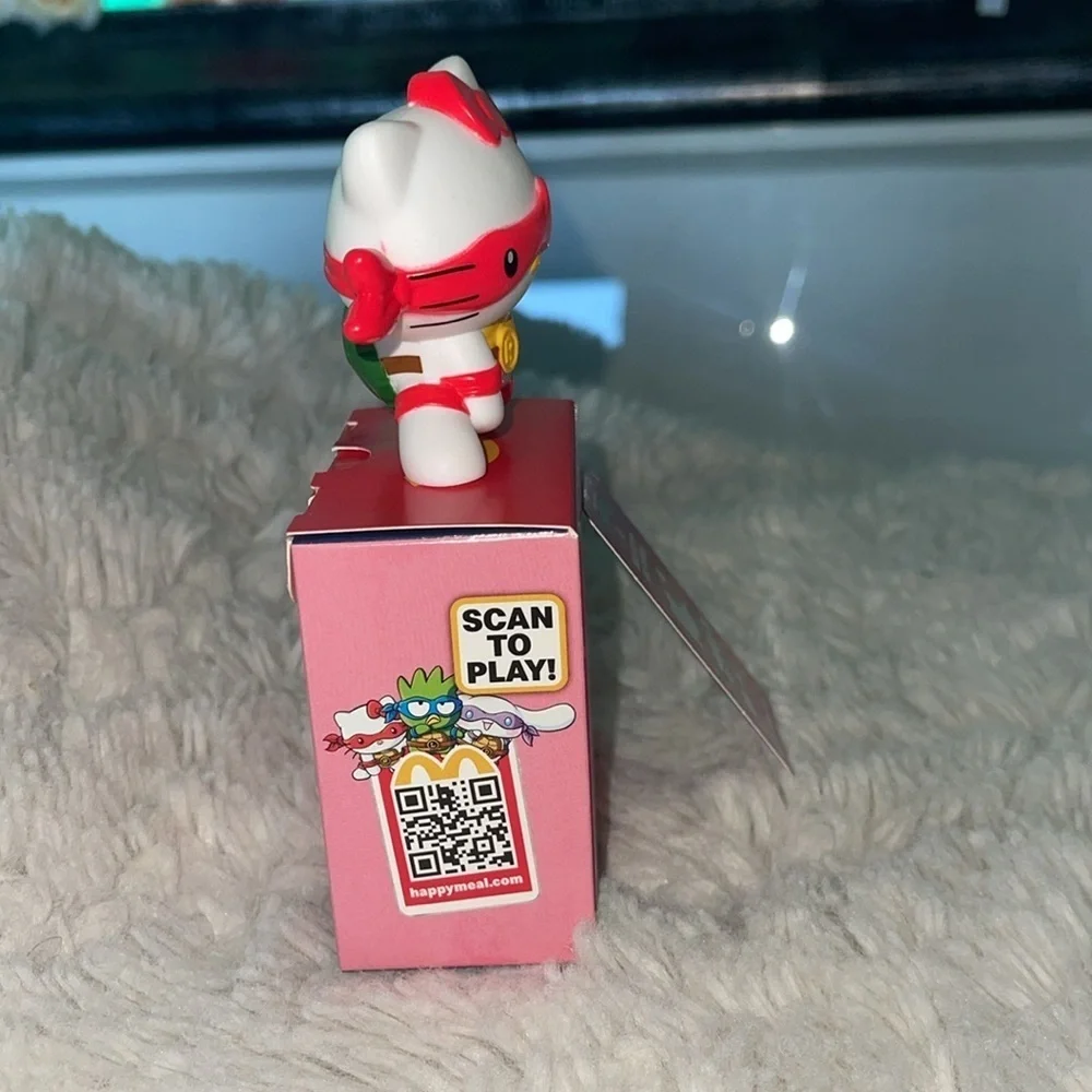 McDonald’s happy meal Sanrio Hello Kitty x Raphael Figure for a game of sorts
